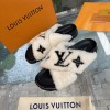 Louis Vuitton Fur black leather slippers