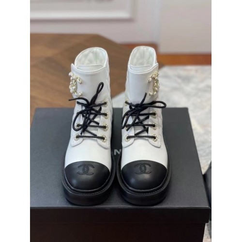 Chanel white CC boots