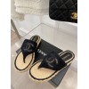 Chanel slippers in raffia