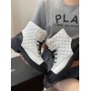 Chanel white CC boots