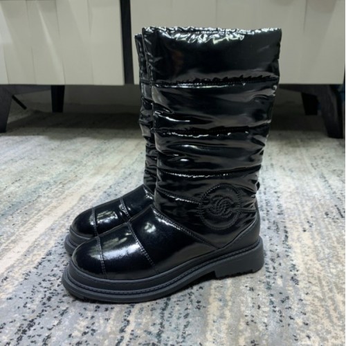 Chanel black patent boots