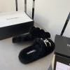 Chanel black shearling slippers