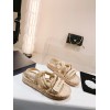 Chanel slippers beige in raffia