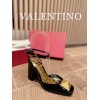 Valentino gold black heels