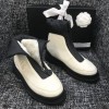 Chanel boots black / white