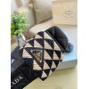 Prada heeled puffer slippers