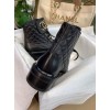 Chanel CC boots