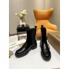 Burberry black patent leather boots