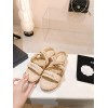 Chanel slippers beige in raffia