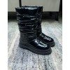 Chanel black patent boots