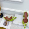 Amina Muaddi green heels
