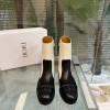 Dior Retro Pattern Cut Leather Boots