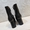 Gucci black GG boots