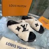 Louis Vuitton Fur black leather slippers
