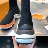 Louis Vuitton orange boots