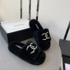 Chanel black shearling slippers
