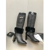 Chanel high shearling boots
