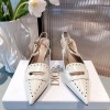 Dior pattern cut white heels