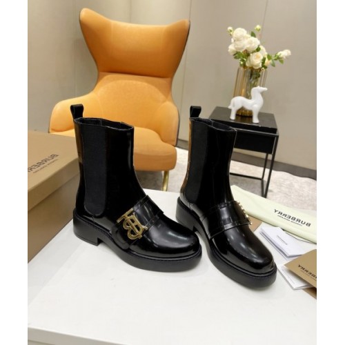 Burberry black patent leather boots