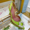 Amina Muaddi green heels