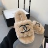 Chanel beige shearling slippers
