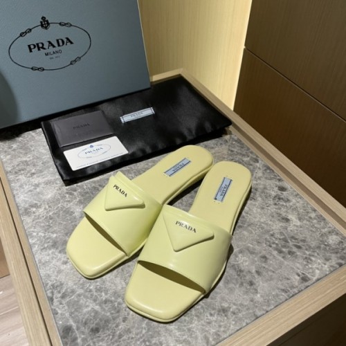 Prada brushed yellow leather slides