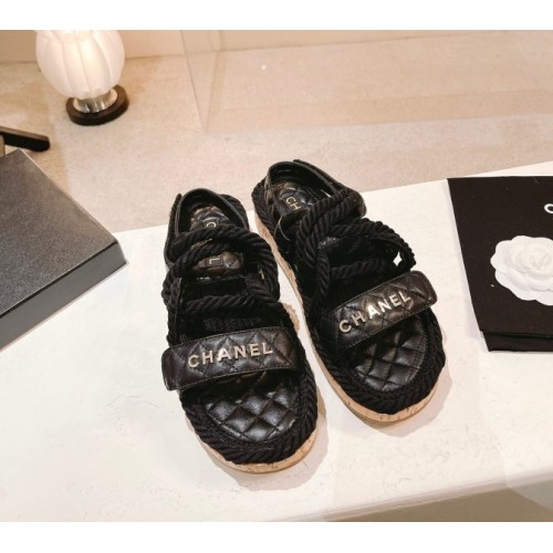 Chanel slippers black in raffia