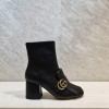 Gucci black GG boots