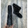 Chanel black patent boots