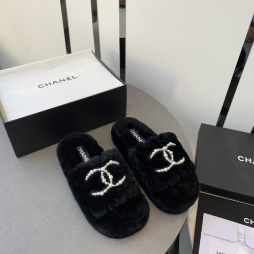 Chanel black shearling slippers