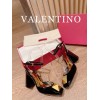 Valentino gold black heels
