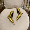 Versace Medusa gold pumps