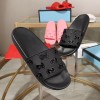 Gucci GG rubber slippers