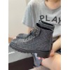 Chanel gray CC boots