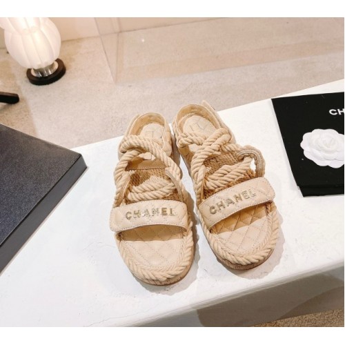 Chanel slippers beige in raffia