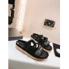Chanel slippers black in raffia
