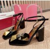Valentino gold black heels