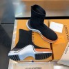 Louis Vuitton orange boots