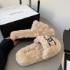 Chanel beige shearling slippers