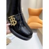 Burberry black patent leather boots